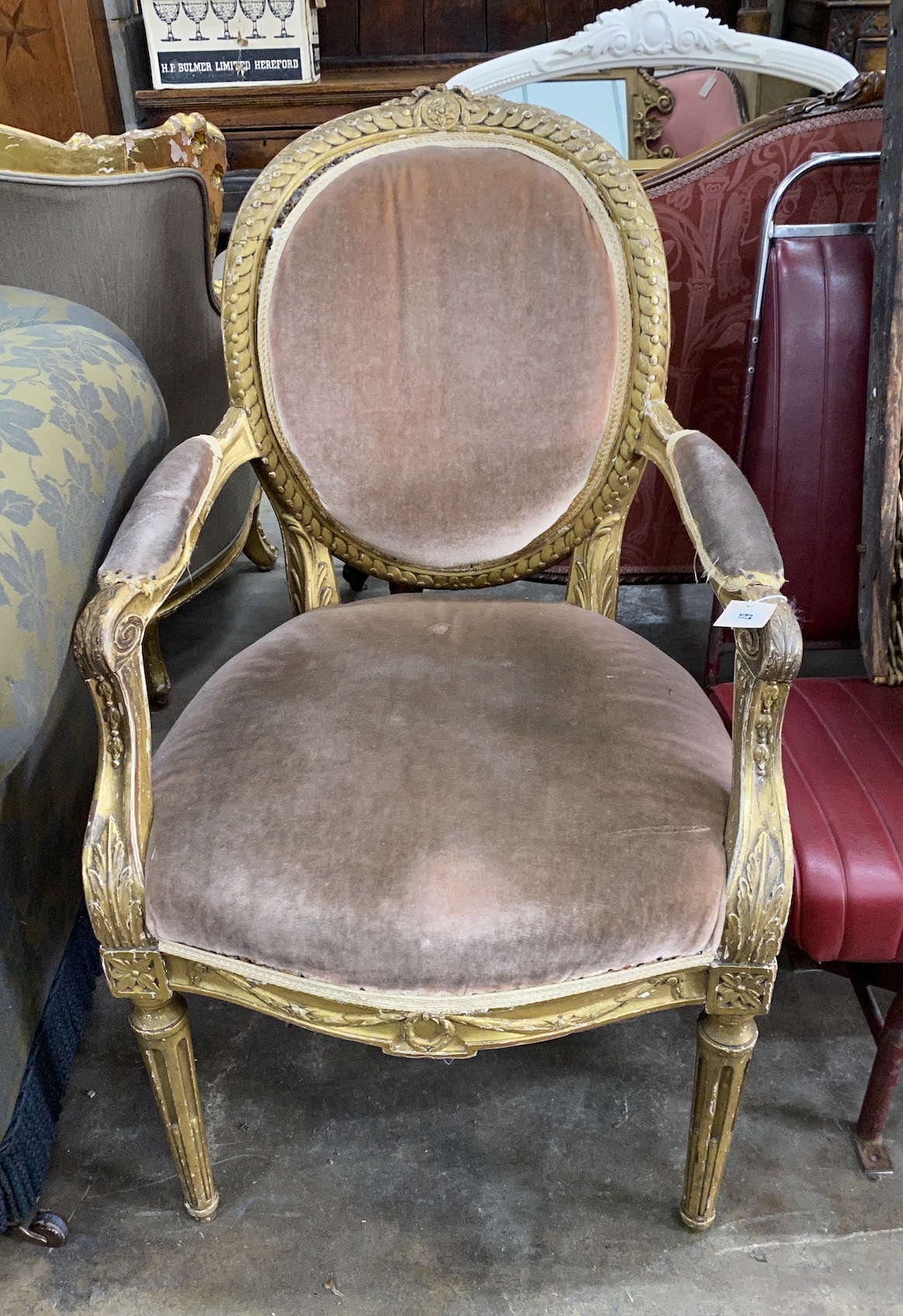 A 19th century French giltwood and composition fauteuil, width 58cm, depth 54cm, height 98cm